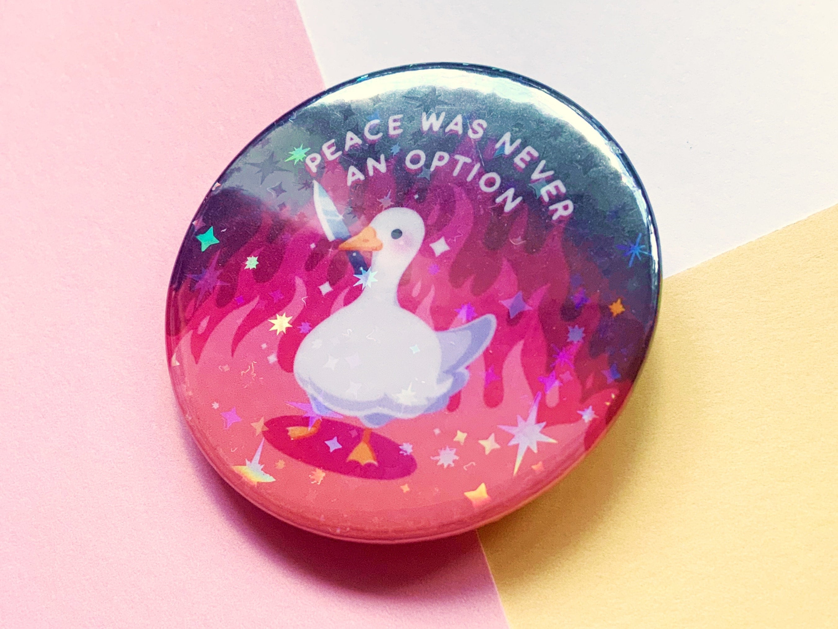 Duck sparkly pin back button 45mm badge | Cute goose with flames ‘Peace was never an option’ | Holographic | Kawaii aesthetic