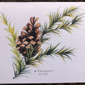 May include: Watercolor painting of a pine cone and branch with green and yellow needles. The artist's signature, "E. Thompson 2021", is in the bottom right corner.