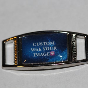 May include: Silver shoe charm with a blue background and the text "CUSTOM With YOUR IMAGE" in white with a pink heart.