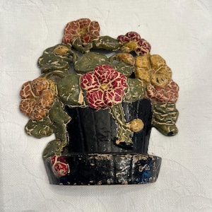 Antique Cast Iron Door Stop Flowers