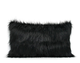 black fluffy pillow
