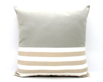 gray and beige pillows