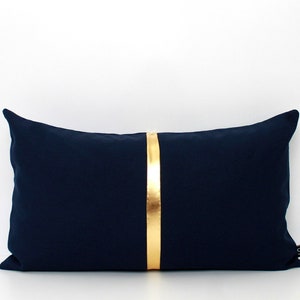 navy gold pillows