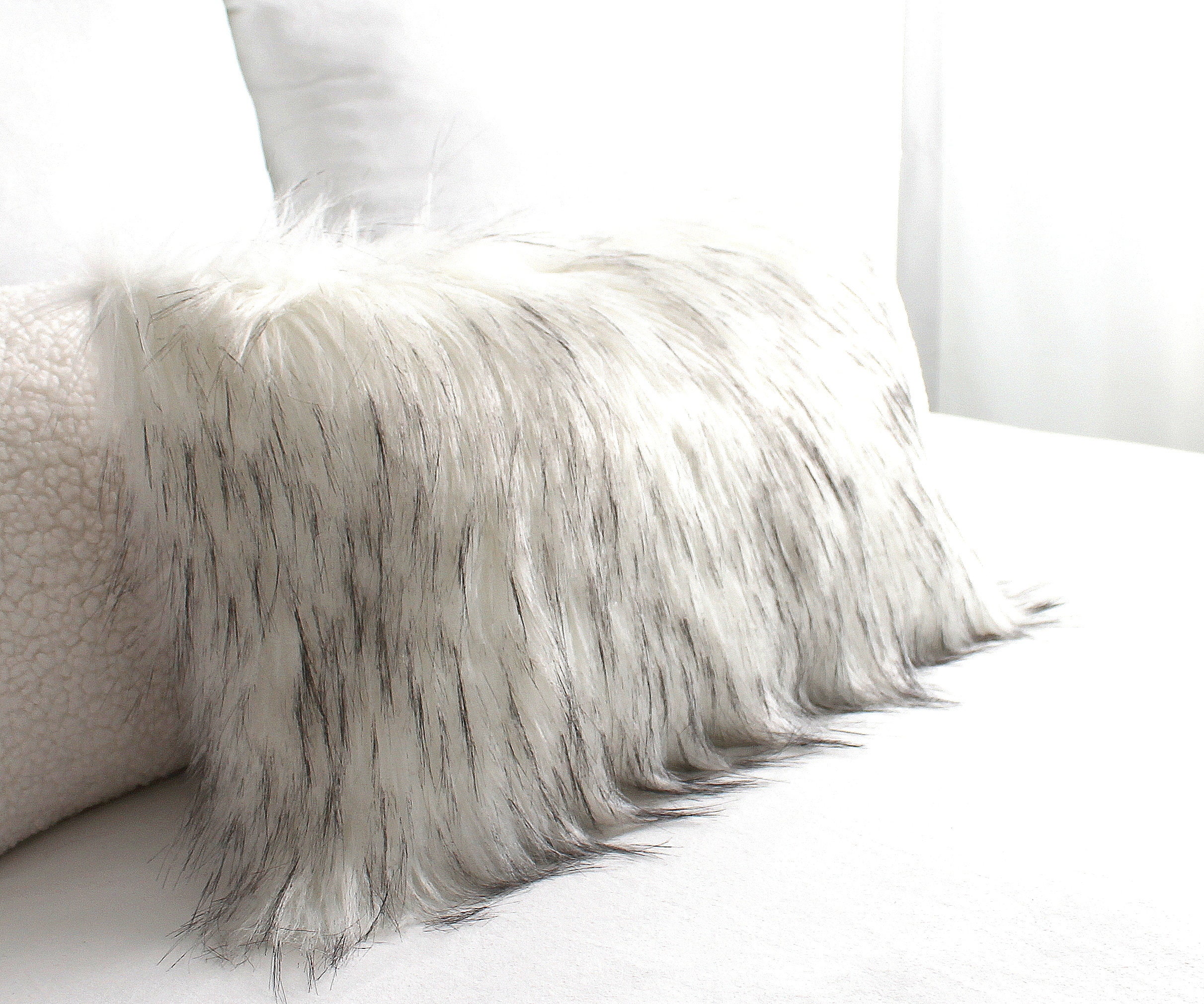Large Bed White Furry Blanket Pillows Upholstered Panel Headboard Colorful  Stock Photo by ©anastasiagorova.gmail.com 314558246