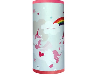 Girl bedside lamp, unicorn theme, pink and blue tones.