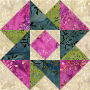 May include: A quilt block with a geometric design featuring pink, green, and blue fabric squares and triangles.