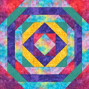 May include: A colorful quilt block with a geometric design. The block features a central square surrounded by concentric squares and triangles in shades of red, purple, yellow, blue, and green.