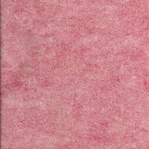May include: A close-up shot of a textured, pink surface. The surface has a mottled appearance with varying shades of pink and a slightly rough texture, suggesting a fabric or paper material.