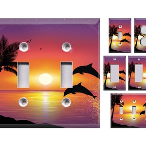 May include: Set of six light switch covers featuring a sunset over the ocean with palm trees and dolphins jumping. The covers are available in a variety of sizes to fit standard light switches.