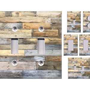 May include: Set of light switch and outlet covers featuring a rustic wood plank design. The covers are available in various sizes and configurations, including single, double, and triple switch covers, as well as outlet covers.
