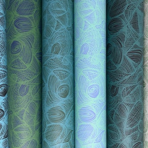 May include: Five rolls of patterned wrapping paper with a blue, green, and white color scheme. The pattern is a repeating design of abstract shapes and lines.