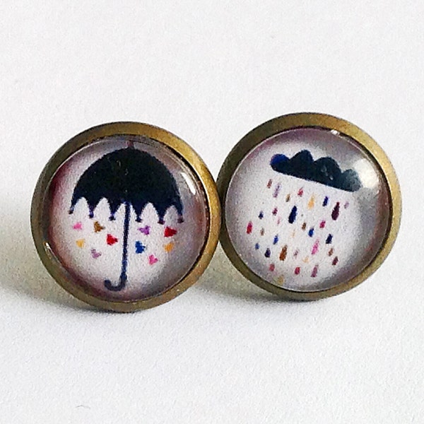 Earring studs or sleepers, umbrella and cloud.