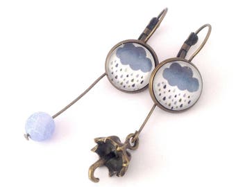 Earrings, bronze, cabochons 14mms, "rainy day". Bracelet charm blue umbrella and pearl.