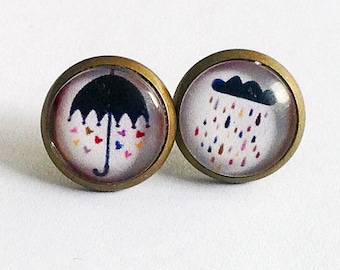 Earring studs or sleepers, umbrella and cloud.