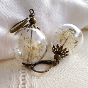 Earrings egrets of dandelions and glass pearls craft. Bronze. Dried flowers.