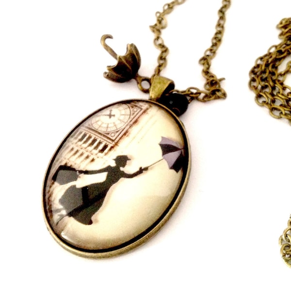 Collier sautoir cabochon ovale : Mary Poppins et Bigben, Londres, perle noir et parapluie, en bronze.