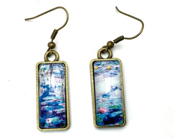 Dangling, mismatched earrings, rectangular cabochons, Nymphéas by Monet.