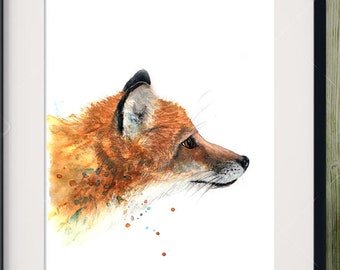 Könnte beinhalten: Ein Aquarellbild eines roten Fuchskopfes und -schulterbereichs, der nach rechts schaut. Der Fuchs ist in Orange-, Braun- und Weißtönen gemalt, mit ein paar Farbspritzern drumherum. Das Bild ist in einem schwarzen Rahmen gerahmt und auf einer Holzoberfläche ausgestellt.