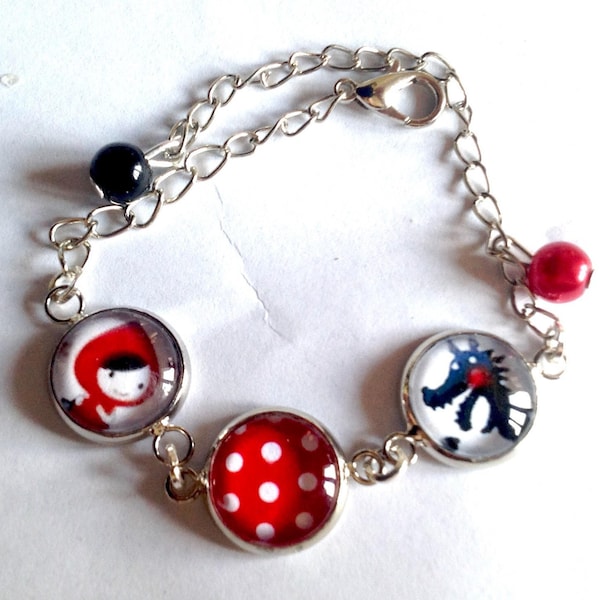 Bracelet chaperon rouge, le loup et pois blanc sur fond rouge, métal argenté, cabochons en verre, perles.