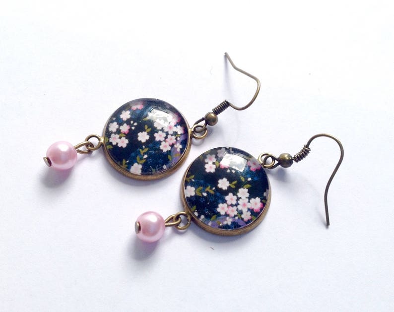 Cherry blossom dangling earrings on a black background, Japanese pattern, pink beads. image 1
