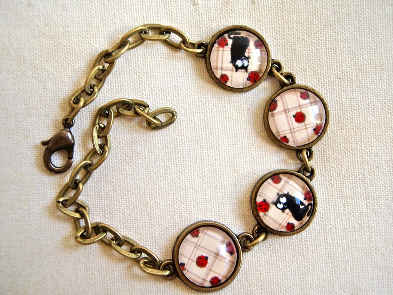 black cat and ladybugs. Small jewelry or tooth box