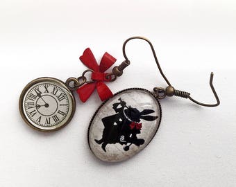 Earrings, bronze, asymmetric, silhouette of rabbit and bracelet charm enamelled in the shape of clock, small red knot.