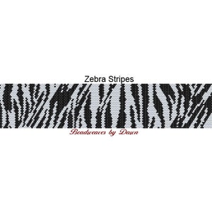 May include: Black and white beaded pattern of zebra stripes. The pattern is called "Zebra Stripes" and is by "Beadweaves by Dawn".