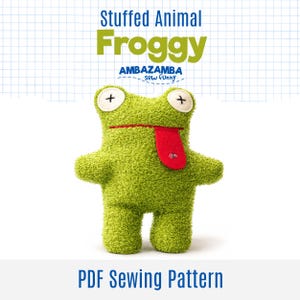 May include: A green stuffed frog with a red tongue, white eyes with black crosses, and a textured body. The text "Stuffed Animal Froggy" and "AMBAZAMBA sew Funny" are at the top. The words "PDF Sewing Pattern" are at the bottom.