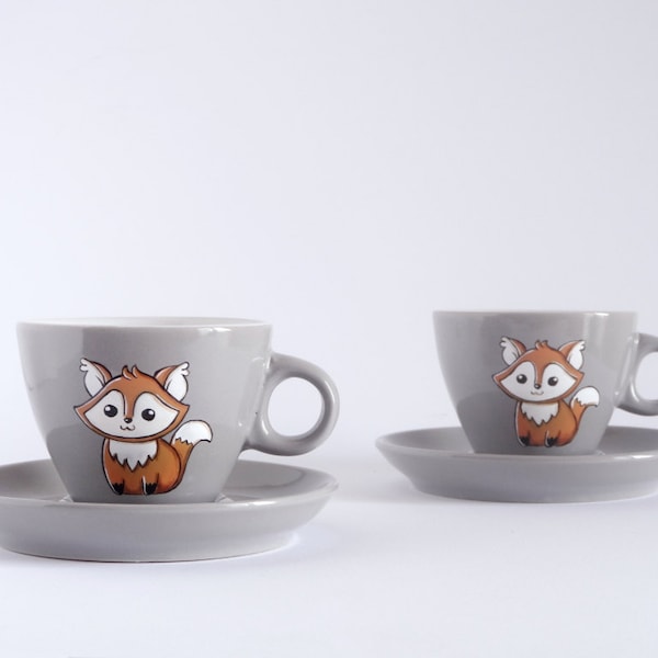 Rustic espresso cups and saucers with foxes