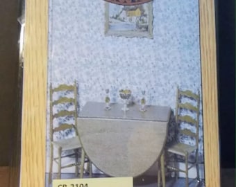 May include: A wooden dollhouse furniture kit by Chrysnbon, model CB-2104, Mode Kit F-150. The kit includes a round table and two chairs. The kit is packaged in a clear plastic bag with a price tag of $14.95.