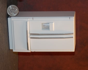 Ges International S.r.l.. Frigo trivalente Dometic RMS8505, cerniera
