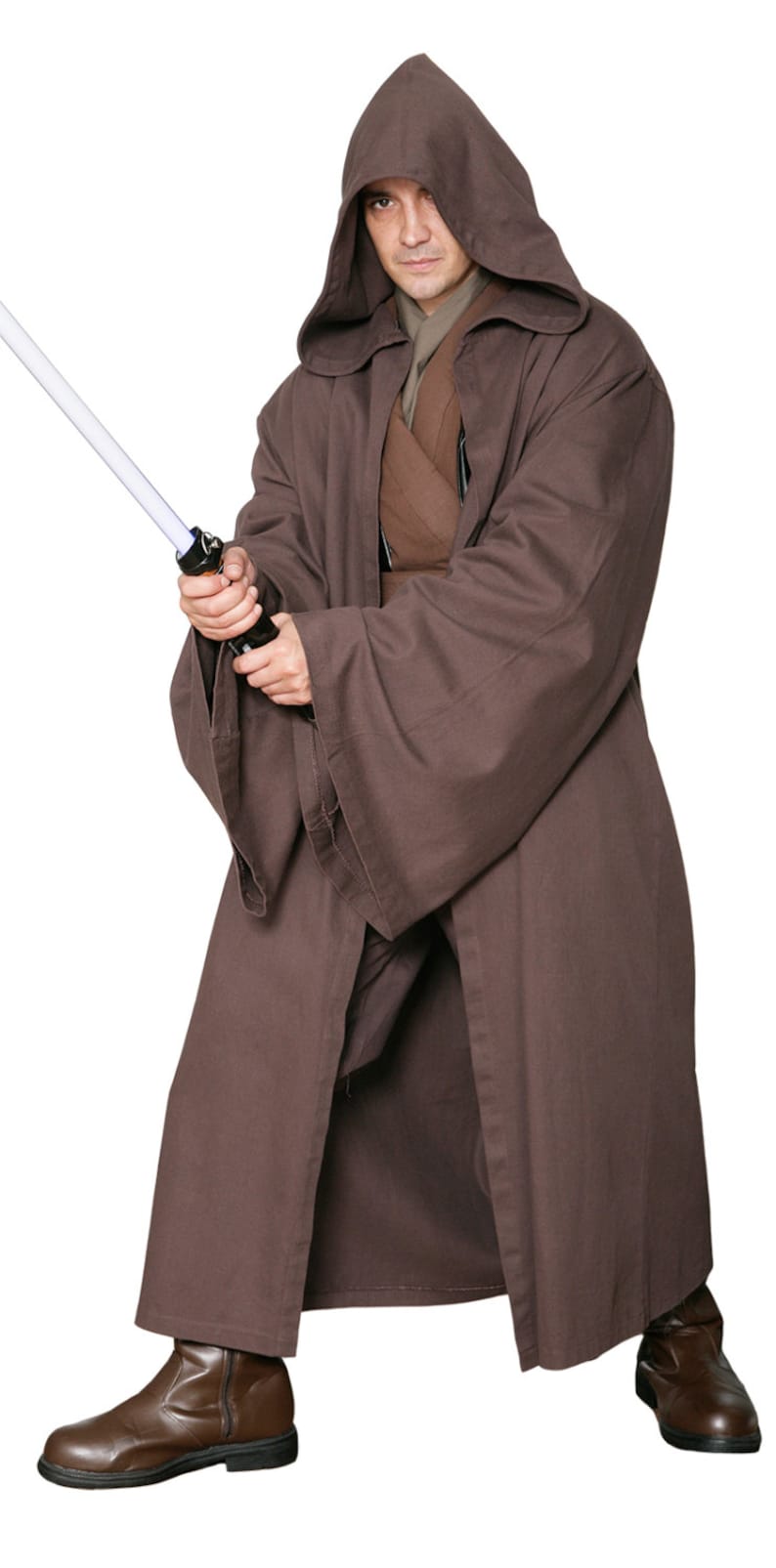 May include: A brown hooded robe costume with a lightsaber. The costume includes a long robe, a tunic, and boots. The lightsaber has a black handle and a white blade. The costume is designed to resemble a Jedi.