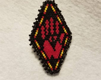red hand broach