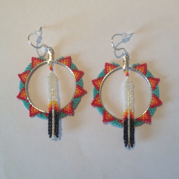 Sunburst hoops with porcupine quill feathers