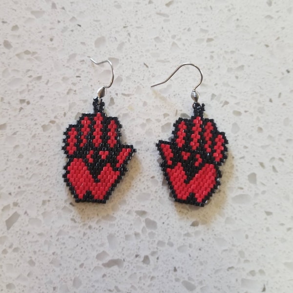 red hand earrings