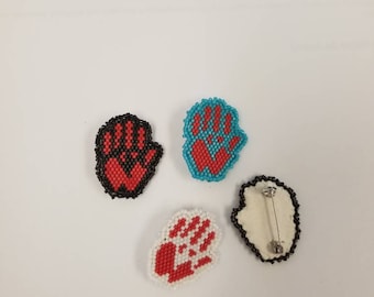 red hand broach