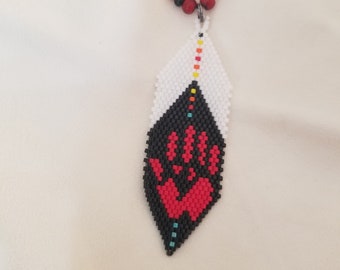 red hand in a feather