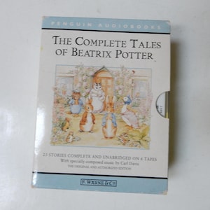 May include: A Penguin Audiobooks cassette tape set titled "The Complete Tales of Beatrix Potter." The box features an illustration of several animal characters. The text includes "23 Stories Complete and Unabridged on 6 Tapes."