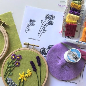 You will need hoop, fabric, water transfer marker, embroidery thread, scissors, and needle.  Two sizes of flowers are printed for every month.  Design to fit your recipient.