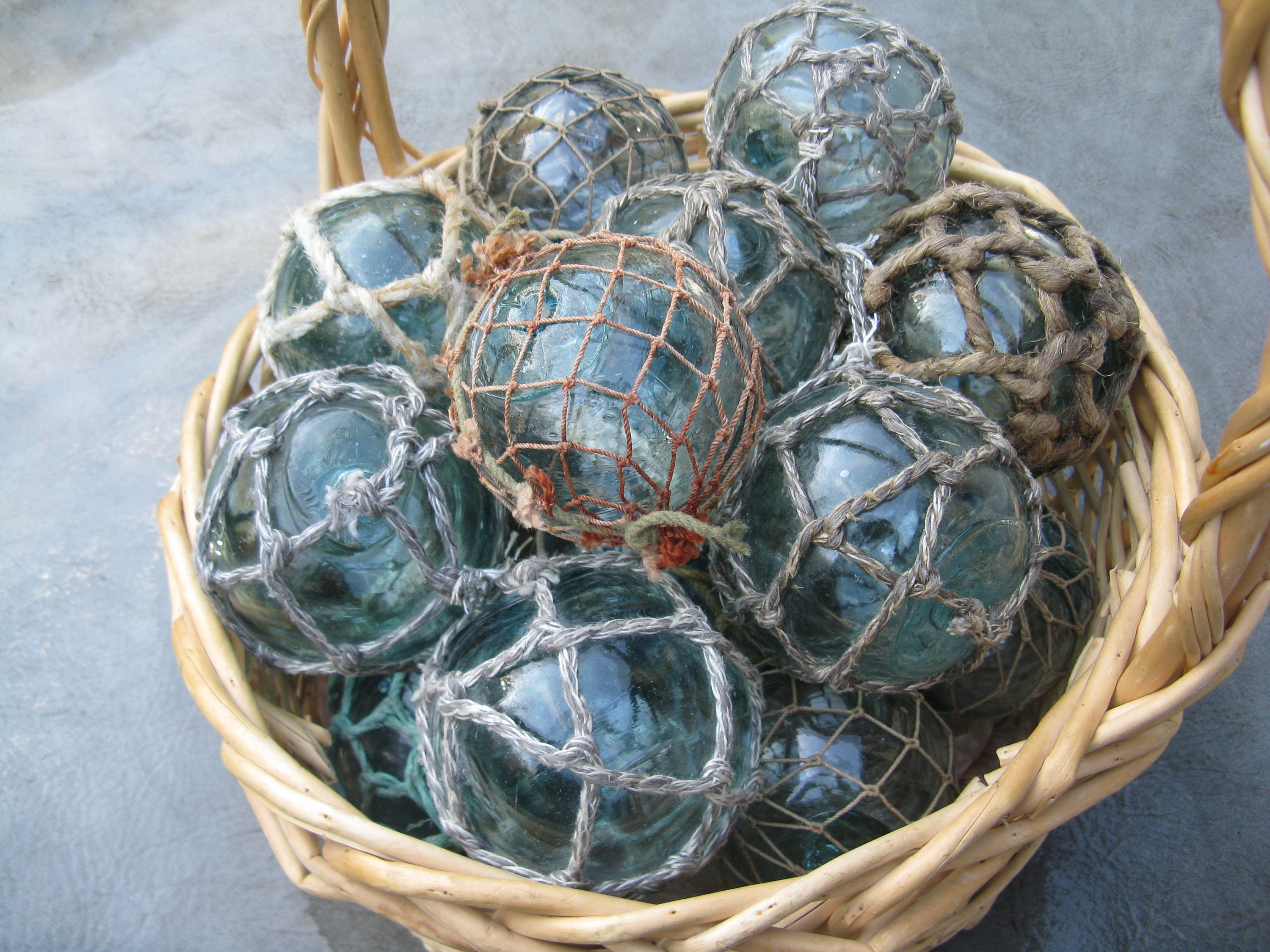 Group of 8 Netted Japanese Glass Fishing Floats, 2.53.5 Glass Float