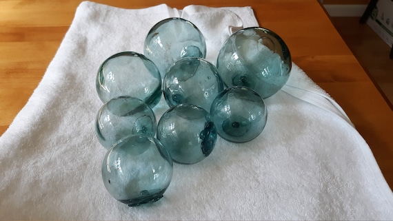 Group of 8 Japanese Glass Fishing Floats, 2.53.5 Glass Float