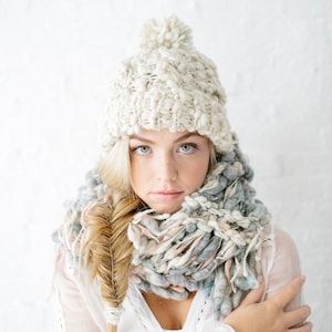 Snow Bunny Cable Hat Pattern for Knitting ~ Bulky Yarn Pattern ~ Rib Brim, Cables and a Pom Pom on top!