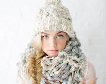 Snow Bunny Cable Hat Pattern for Knitting ~ Bulky Yarn Pattern ~ Rib Brim, Cables and a Pom Pom on top!