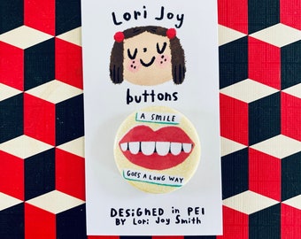 1.25"  "A Smile Goes a Long Way" Button