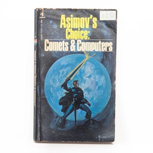 May include: Vintage paperback book titled "Asimov's Choice: Comets & Computers." The cover features a science fiction illustration of a figure with a sword in front of a blue planet. The book has a price tag of $2.50.