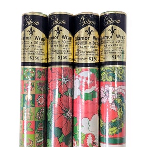 May include: Four rolls of vintage "Glamor Wrap" gift wrap, each 76.2 cm by 76.2 cm. The rolls display festive Christmas patterns in red, green, and gold, including poinsettias, bows, and gingerbread men. The brand name "Gibson" is printed on the top.