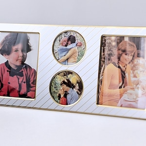 May include: A rectangular photo frame with a white and gold striped design. It holds three photos: one rectangular and two circular. The photos feature people in vintage clothing.