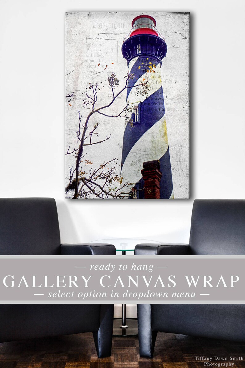 May include: Canvas print of a lighthouse with blue and white stripes, a red top, and a brick chimney. The image has a vintage, textured effect. The words "ready to hang" and "Gallery Canvas Wrap" are displayed.