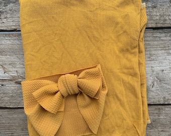 mustard yellow swaddle