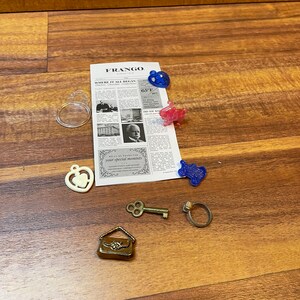 Assorted tickets, miniatures and small newspaper lot